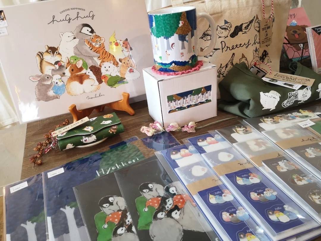 hug hugのポスターとマグカップ